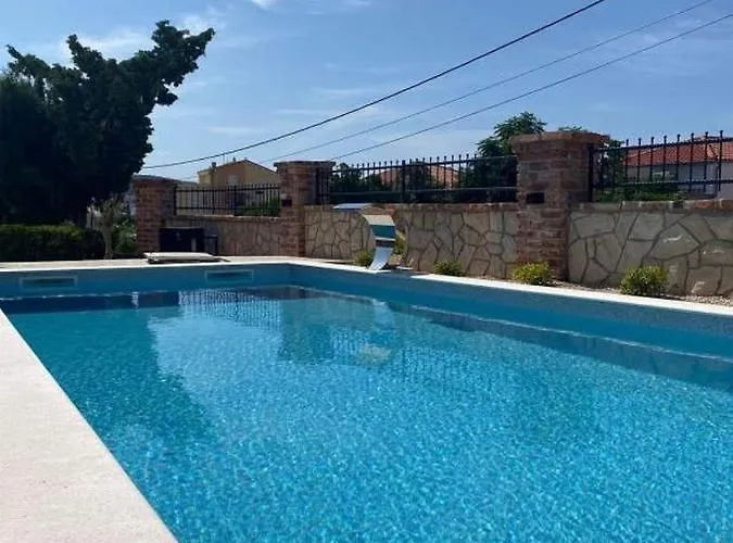 Seaside Family Friendly House With A Swimming Pool Barbat, Rab - 22081 Holiday home Rab Town