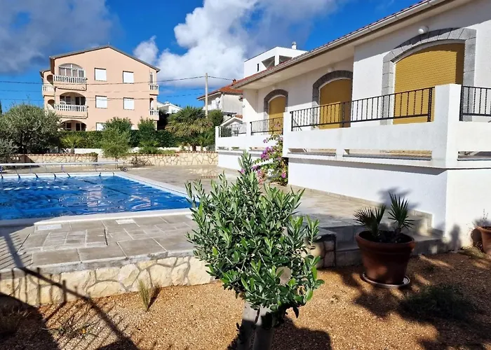 Seaside Family Friendly House With A Swimming Pool Barbat, Rab - 22081 Holiday home